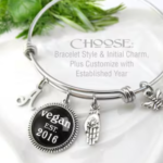 Custome vegan charm bracelet. Silver with a pendant saying "Vegan Est. 2016"